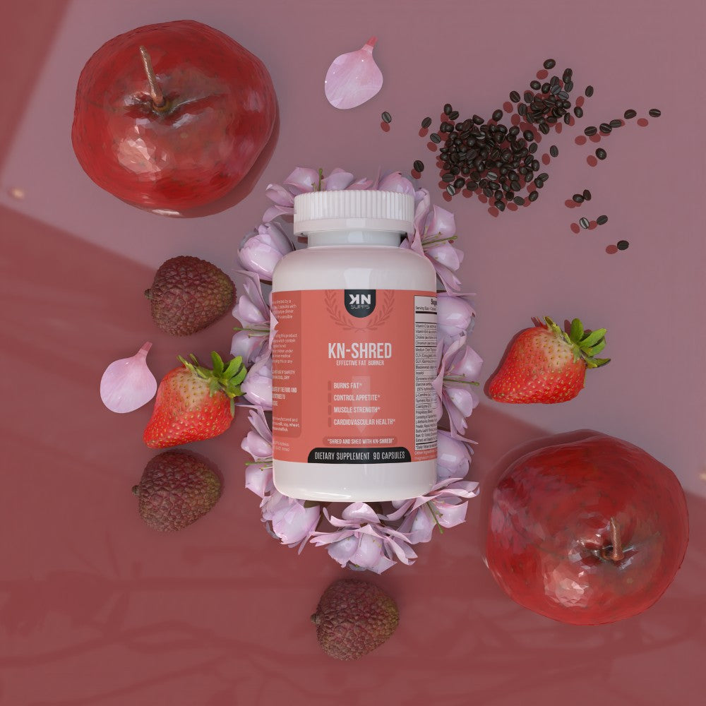 KN-Shred fat burner supplement bottle surrounded by strawberries, apples, and other natural ingredients, emphasizing its blend of natural components for effective weight loss without caffeine.